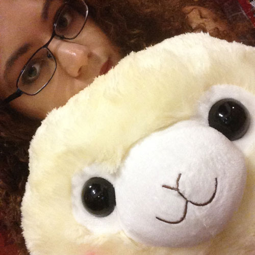 Cara and a stuffed alpaca